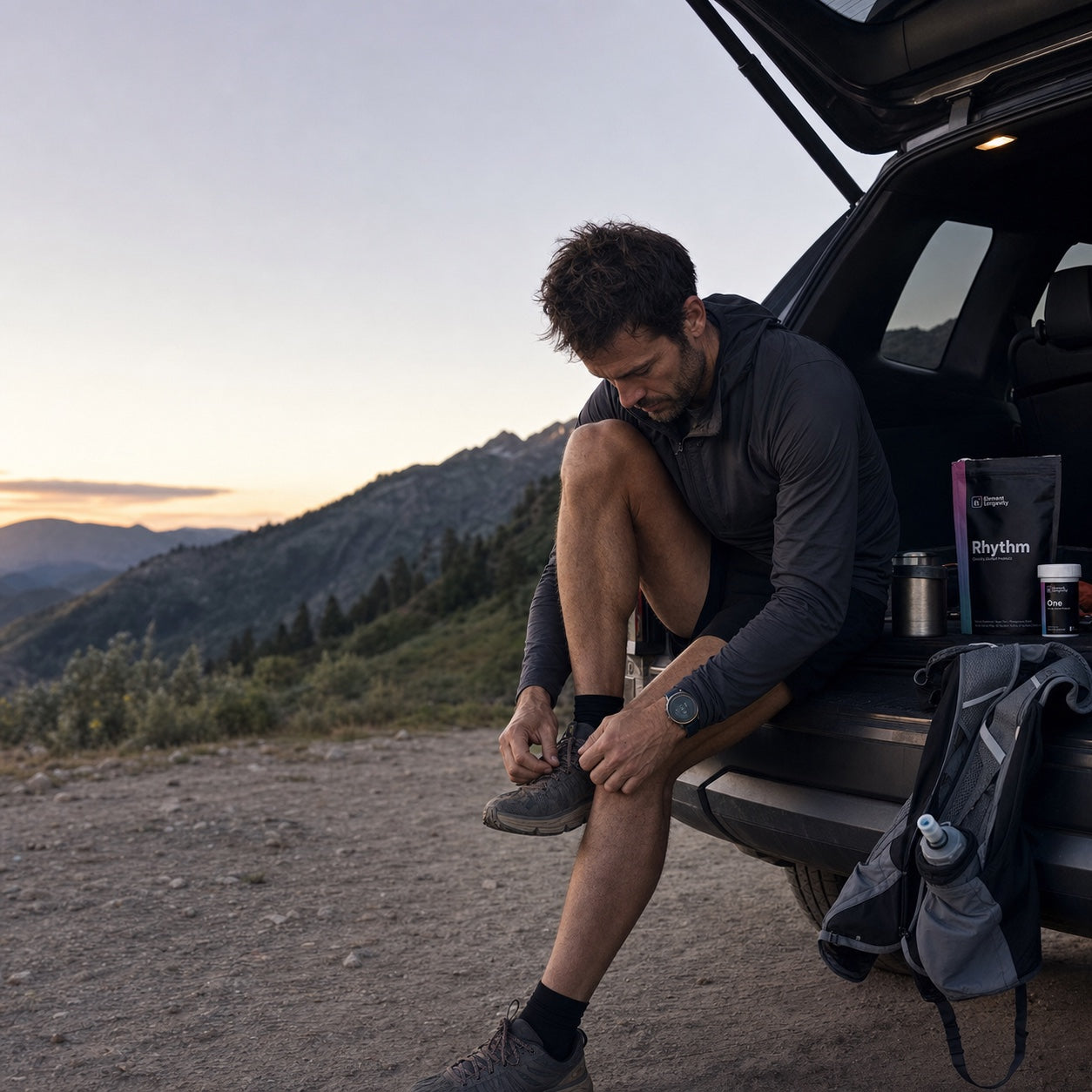 An amateur cyclist fueling during a long training day